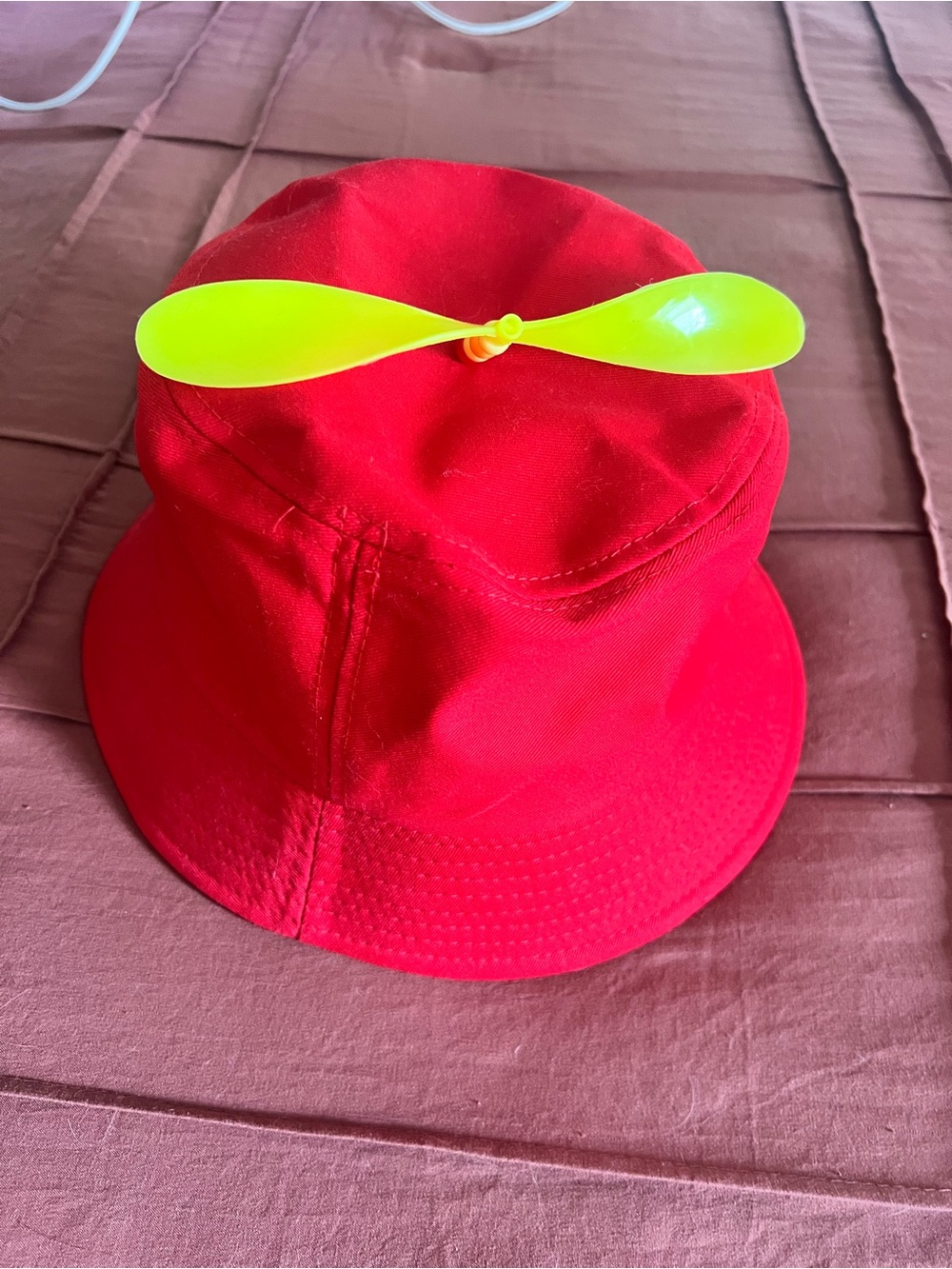 Bright Red Bucket Hat with Neon Yellow Propeller
